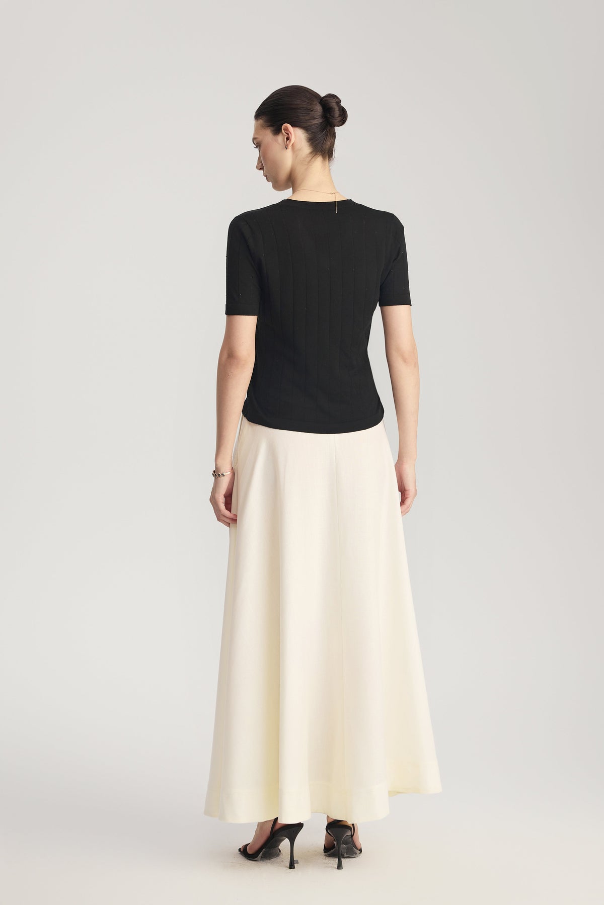 MIRA Wool Silk Linen Bias-Cut Long Skirt in Ivory White – movement detail
