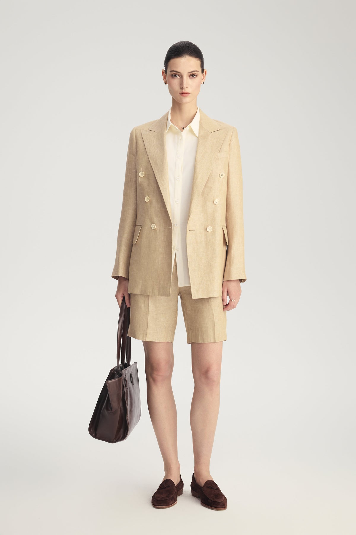 MIRA Metallic Linen Bermuda Shorts in Desert Titanium – styled front view